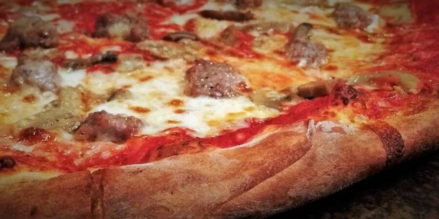 Old-School Pizza in Philadelphia: Long before there were water-filtering, artisan flour-dusting scholars of pizza in the area, there have been corner shops and family-owned parlors making the regional specialty of tomato pie and other local fan favorites. These pizzas might not hew to centuries-old Italian hydration ratios—but they perform just fine on any taste test.