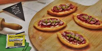 Football Pizza - Transform your favorite pepperoni pizza into a football for the next big game.