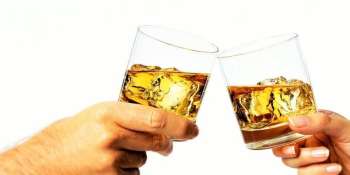 Whiskey 101: How to Drink Whiskey  How to Drink Whiskey  In the old days, Puritans had a very specific etiquette when it comes to drinking whiskey. For them, whiskey must be purely enjoyed from a tulip-shaped glass with a dash of still water. The addition of still water is necessary to maximize the uniquely delicious aroma of whiskey. Keep in mind that ice actually mutes rather than strengthens the aroma of whiskey.