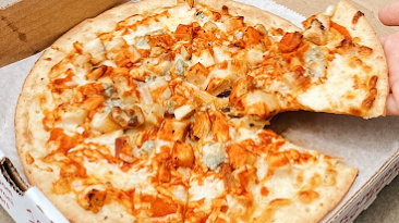 Top Tomato Bar & Pizza in Midtown Village