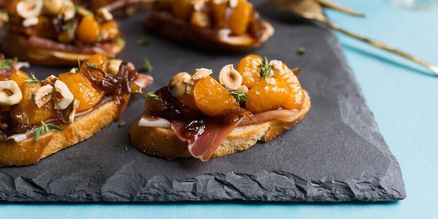 Mandarin Halos Prosciutto Bruschetta Bites